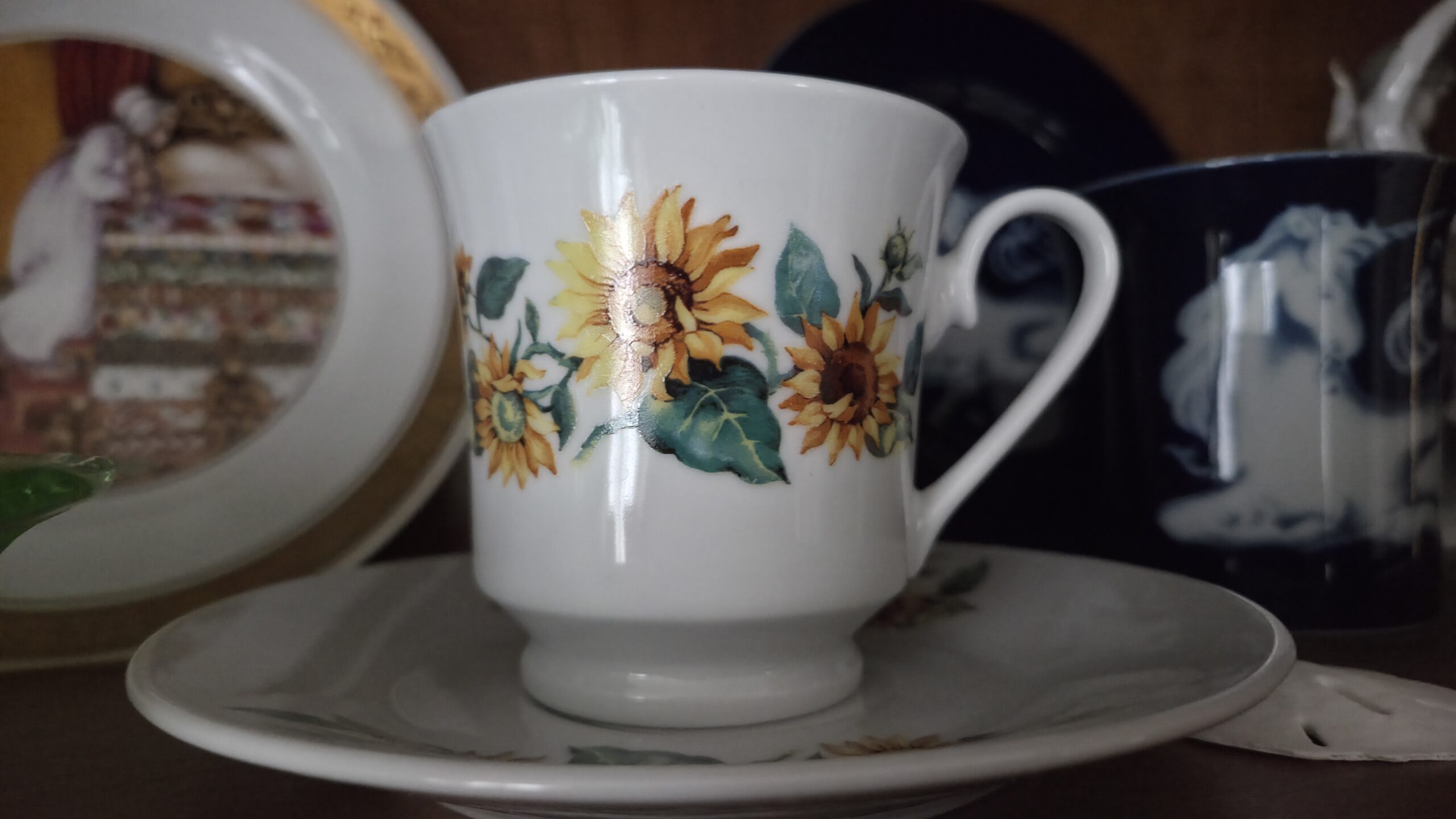 When I was a child, I thought all the cups my grandmother let me choose from were antiques. But the sunflowers were one of my favorites, and although this one's listed as "vintage" now, it was new in the early 1970s.